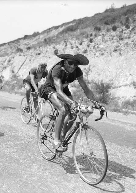 Stage 13 of the 1950 Tour de France, Ferdi Kubler wears a straw hat to protect himself from the sun