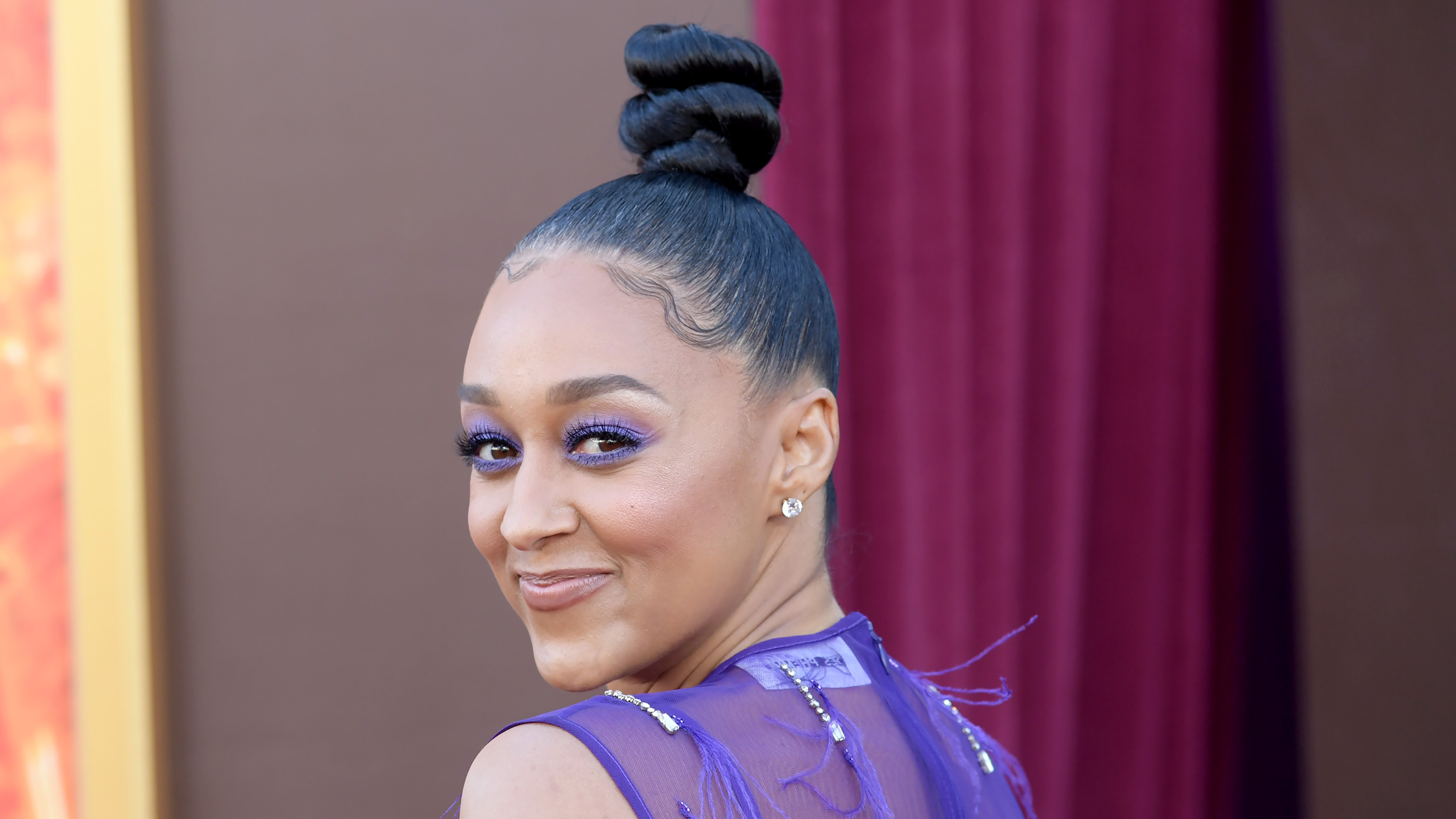 Tia Mowry Wore Her Hair In Thigh Grazing Braids For Her Latest Vacation 