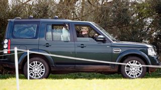 Princess Anne, Princess Royal, with her bull terrier dog, seen driving her Land Rover Discovery as she attends the Gatcombe Horse Trials at Gatcombe Park on March 23, 2019