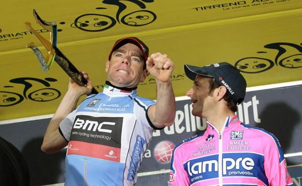 Cadel Evans (BMC) wields the winner's trident.