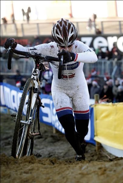 World Cup leader Katie Compton (Planet Bike) tackles a run-up.