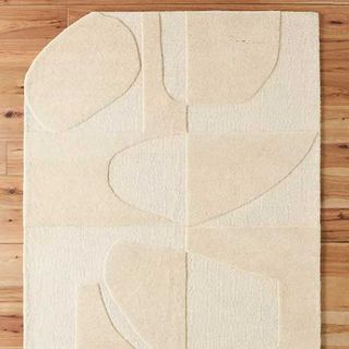 cream rug with graphic pattern