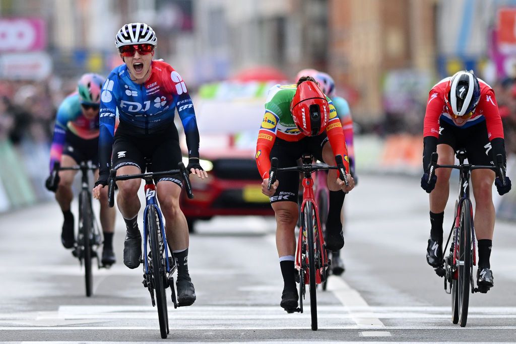 LIEGE BELGIUM APRIL 24 LR Grace Brown of Australia and Team FDJ Suez celebrates at finish line as race winner ahead of Elisa Longo Borghini of Italy and Team Lidl Trek and Demi Vollering of The Netherlands and Team SD Worx Protime during the 8th Liege Bastogne Liege Femmes 2024 a 1529km one day race from Bastogne to Liege UCIWWT on April 24 2024 in Liege Belgium Photo by Dario BelingheriGetty Images