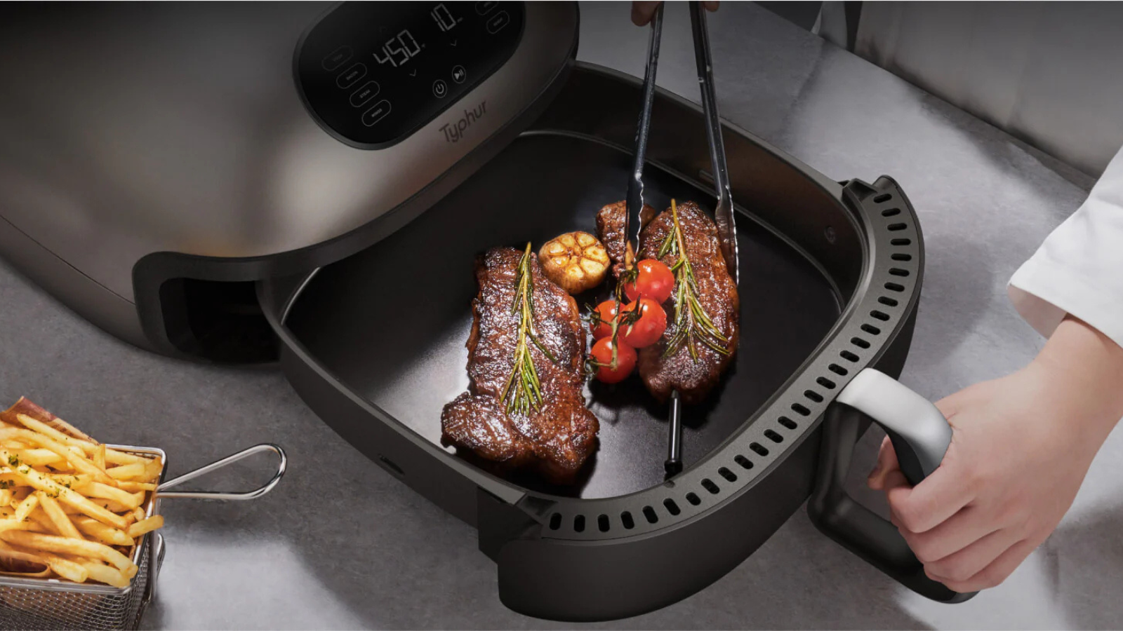 Typhur Dome Air Fryer cooking steaks