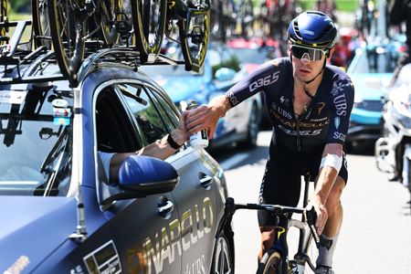 VILLARS-SUR-OLLON, SWITZERLAND - JUNE 21: Marcel Camprubi of Spain and Team Pinarello Q36.5 Pro Cycling assisted by the team car during the 89th Tour de Suisse 2026, Stage 5 a 150.7km stage from Villars-sur-Ollon to Villars-sur-Ollon 1249m / #UCIWT / on June 21, 2026 in Villars-sur-Ollon, Switzerland. (Photo by Tim de Waele/Getty Images)