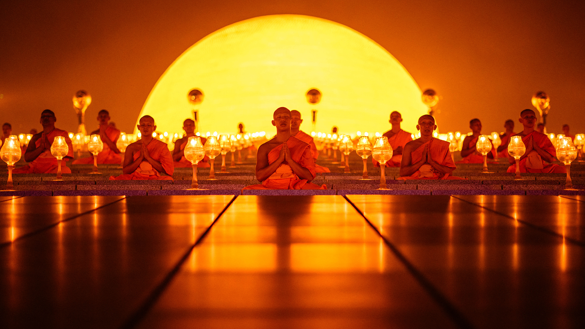 Buddhist monks take part in Māgha Pūjā celebrations at the Wat Phra Dhammakaya temple in Pathum Thani province, Thailand