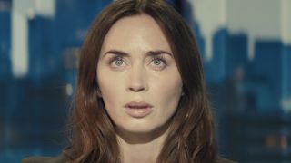 Emily Blunt's meteorologist looking up into bright light in Disclosure Day