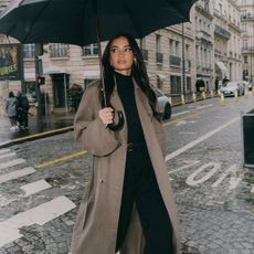 kelsey merritt in wearing an umbrella