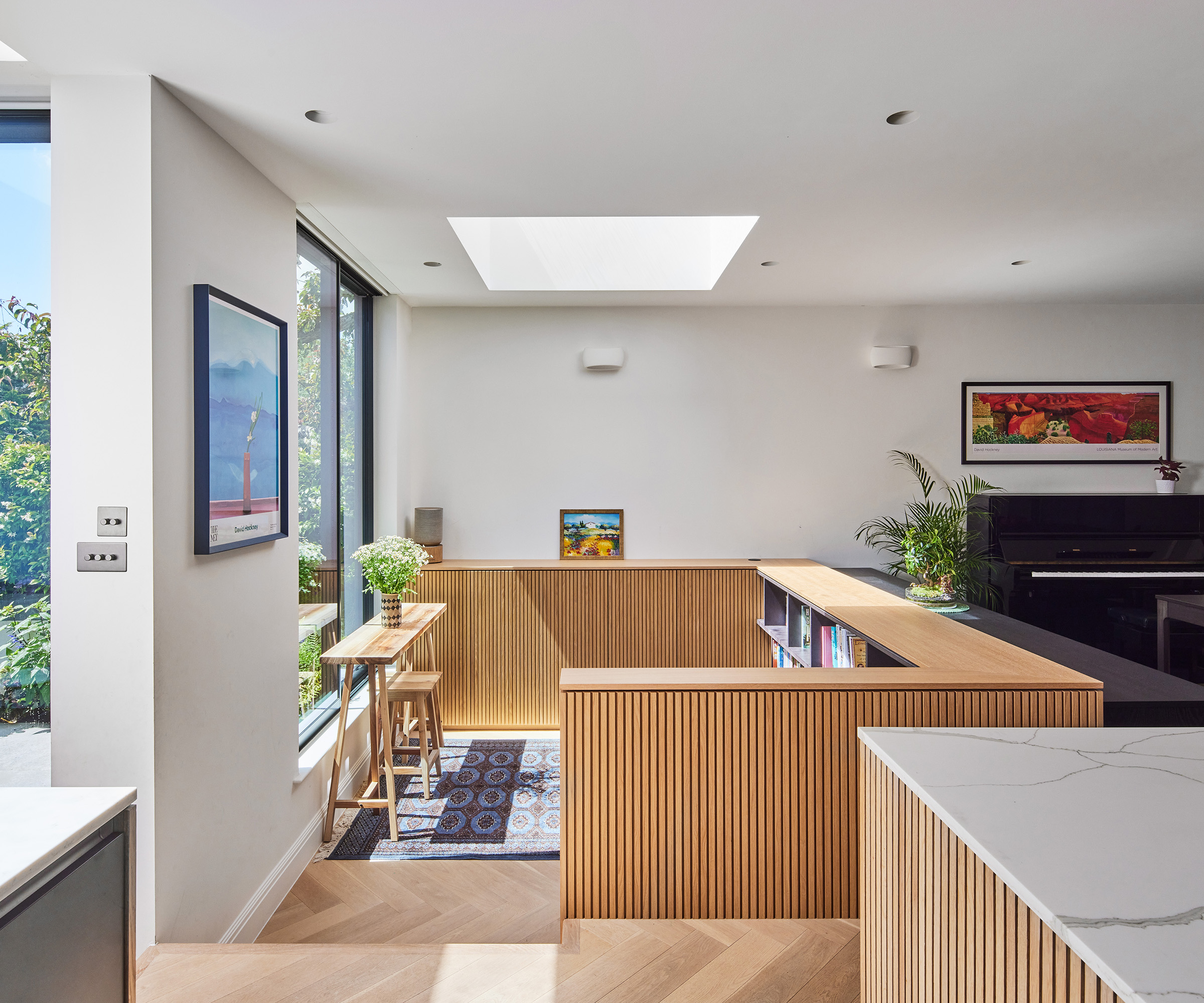 a play area and study nook built especially for two children to do their homework. Clad in beautiful light timber