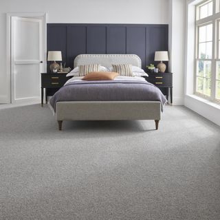 Grey bedroom with grey flat weave carpet