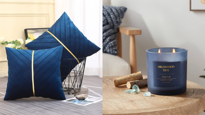 Two navy blue cushions and a navy blue candle on a table