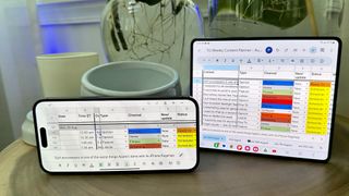 Samsung Galaxy Z Fold 5 and iPhone 14 Pro Max showing Google Sheets document