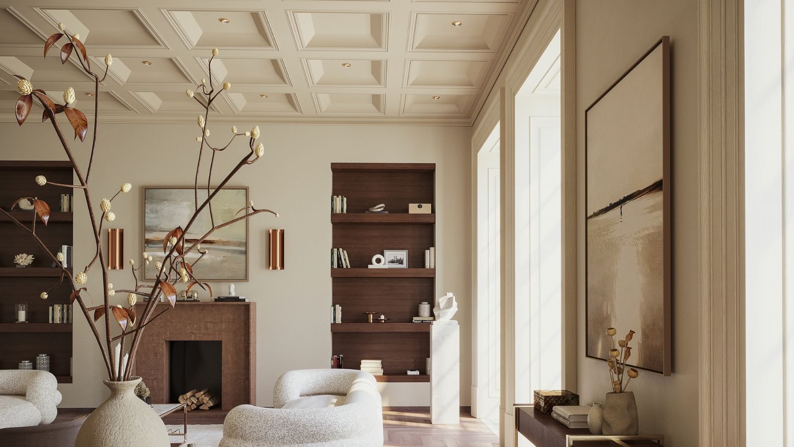 A grand living and dining space with a detailed cream coffered ceiling, dark walnut built-in bookshelves and a terracotta fireplace. Sculptural boucle armchairs surround a round walnut dining table, with herringbone parquet flooring and tall windows flooding the room with light.