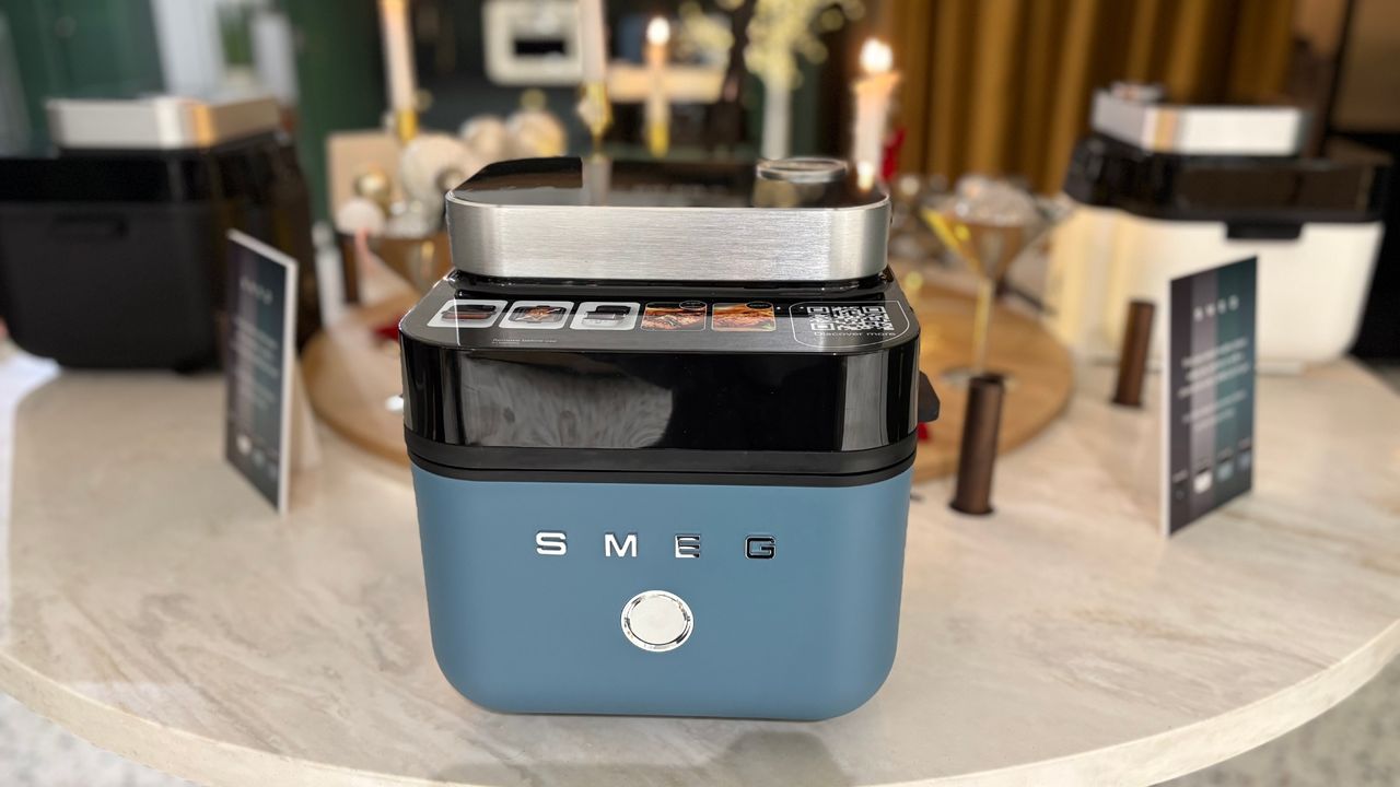Smeg Air Fryer in blue on a table