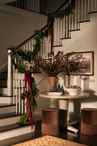 Christmas entryway with stair garland