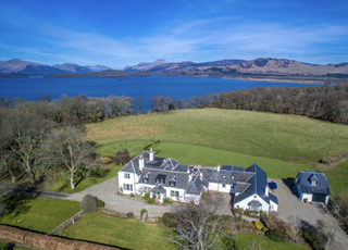 Remote property for sale on an island in Loch Lomond