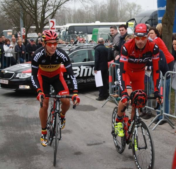 Philippe Gilbert and George Hincapie (BMC) ride to the start of Gent-Wevelgem.