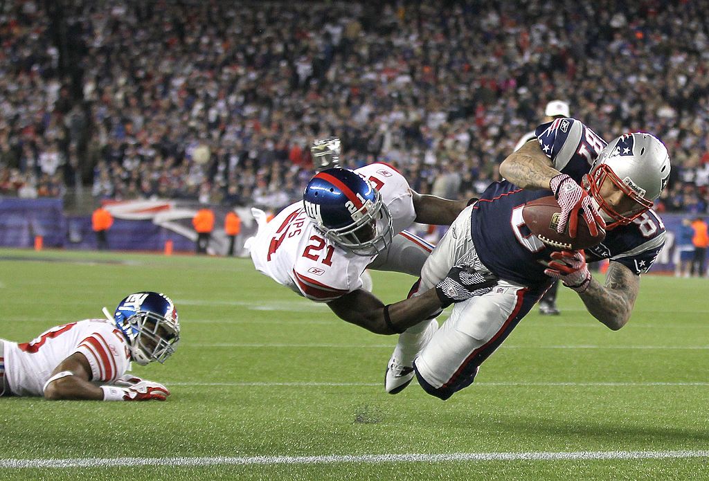 New England Patriots player Aaron Hernandez, shown here in 2011, was diagnosed with chronic traumatic encephalopathy after his death in 2017.