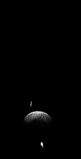 A radar image of the triple asteroid system 2001 SN263.