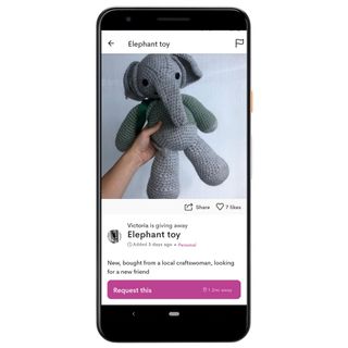 mobile phone displaying elephant toy image