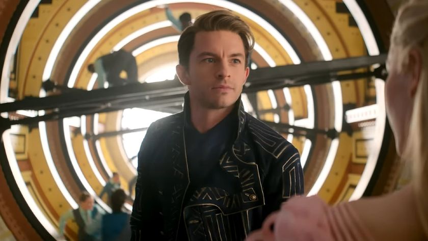 Jonathan Bailey looking at Ariana Grande in Wicked. 