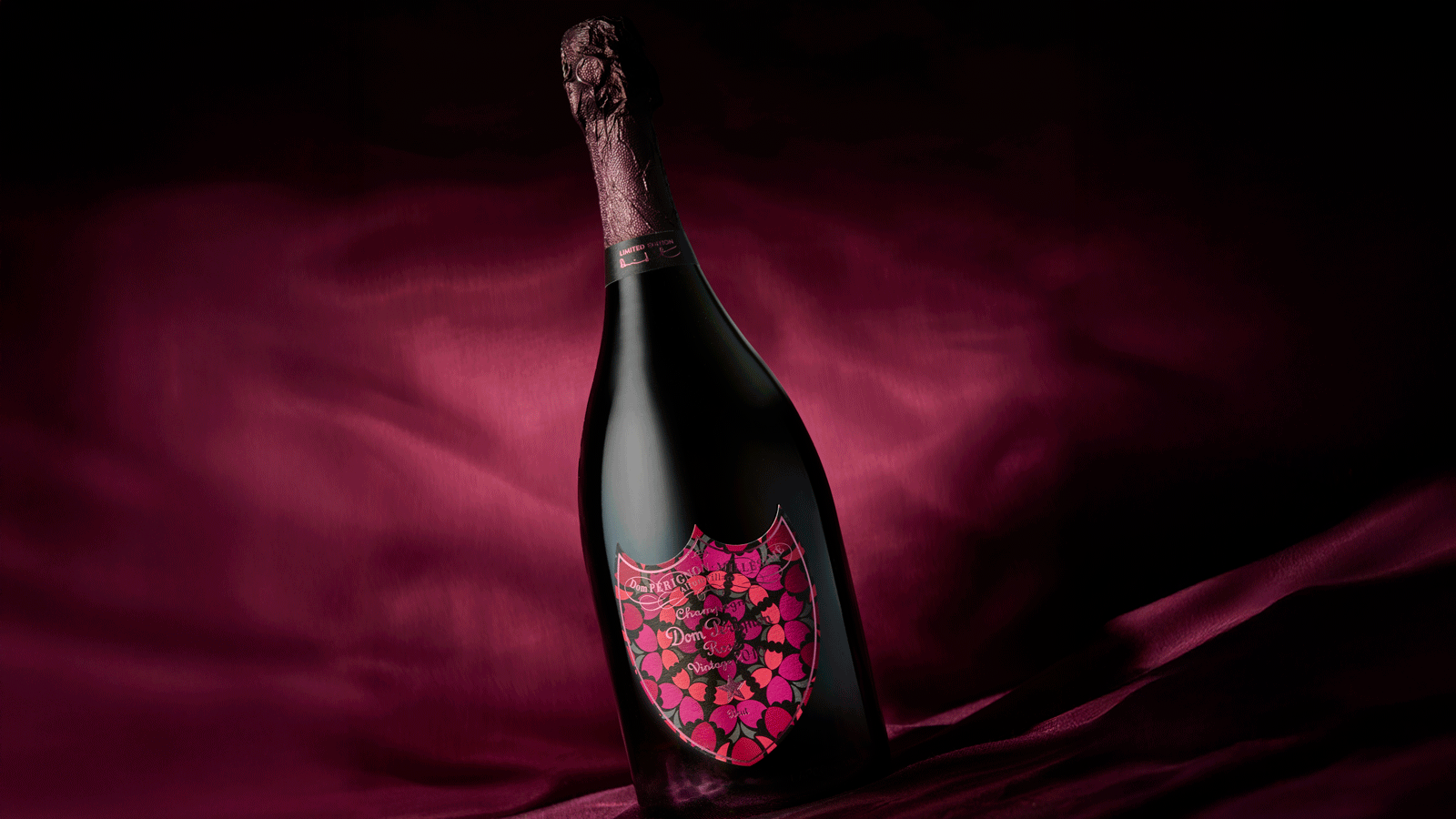 bottle of dom perignon champagne with pink label