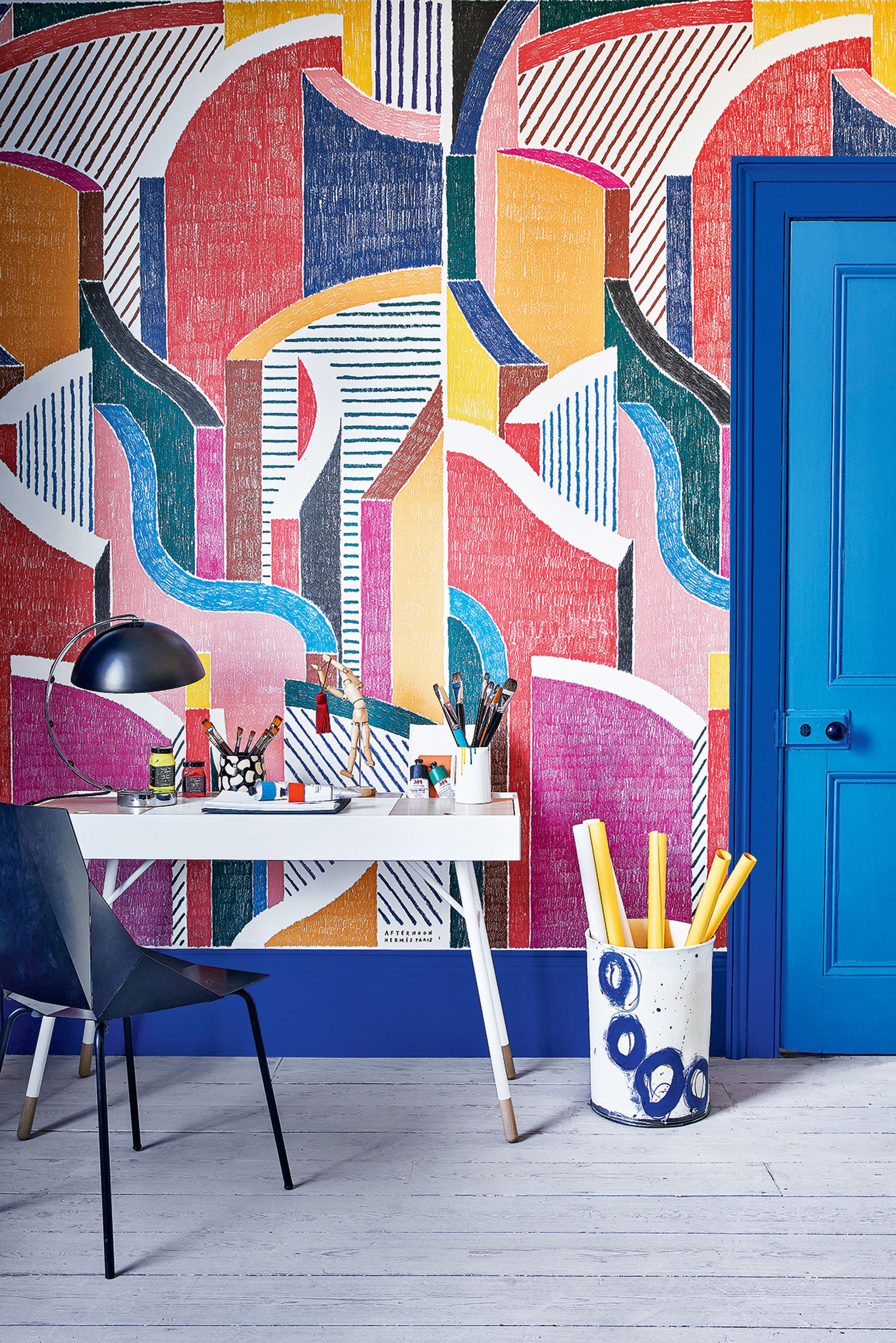 a bold mural wallpaper in an office