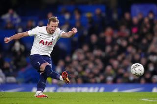 Tottenham Hotspur’s Harry Kane takes a free-kick which is saved by goalkeeper Kepa Arrizabalaga (not pictured) during the Carabao Cup semi final first leg match at Stamford Bridge, London. Picture date: Wednesday January 5, 2022