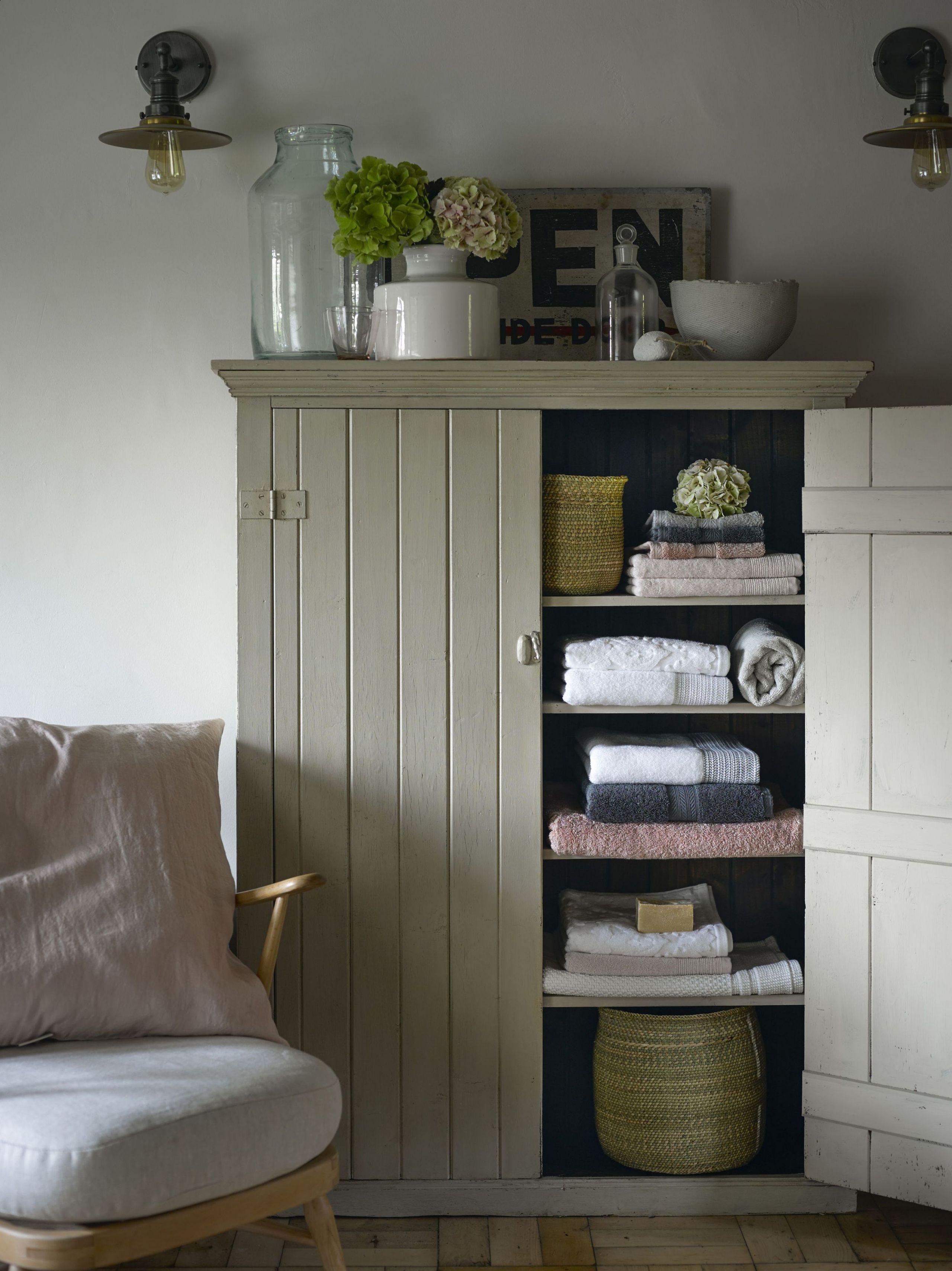 Upcycled unit used as a bathroom storage idea