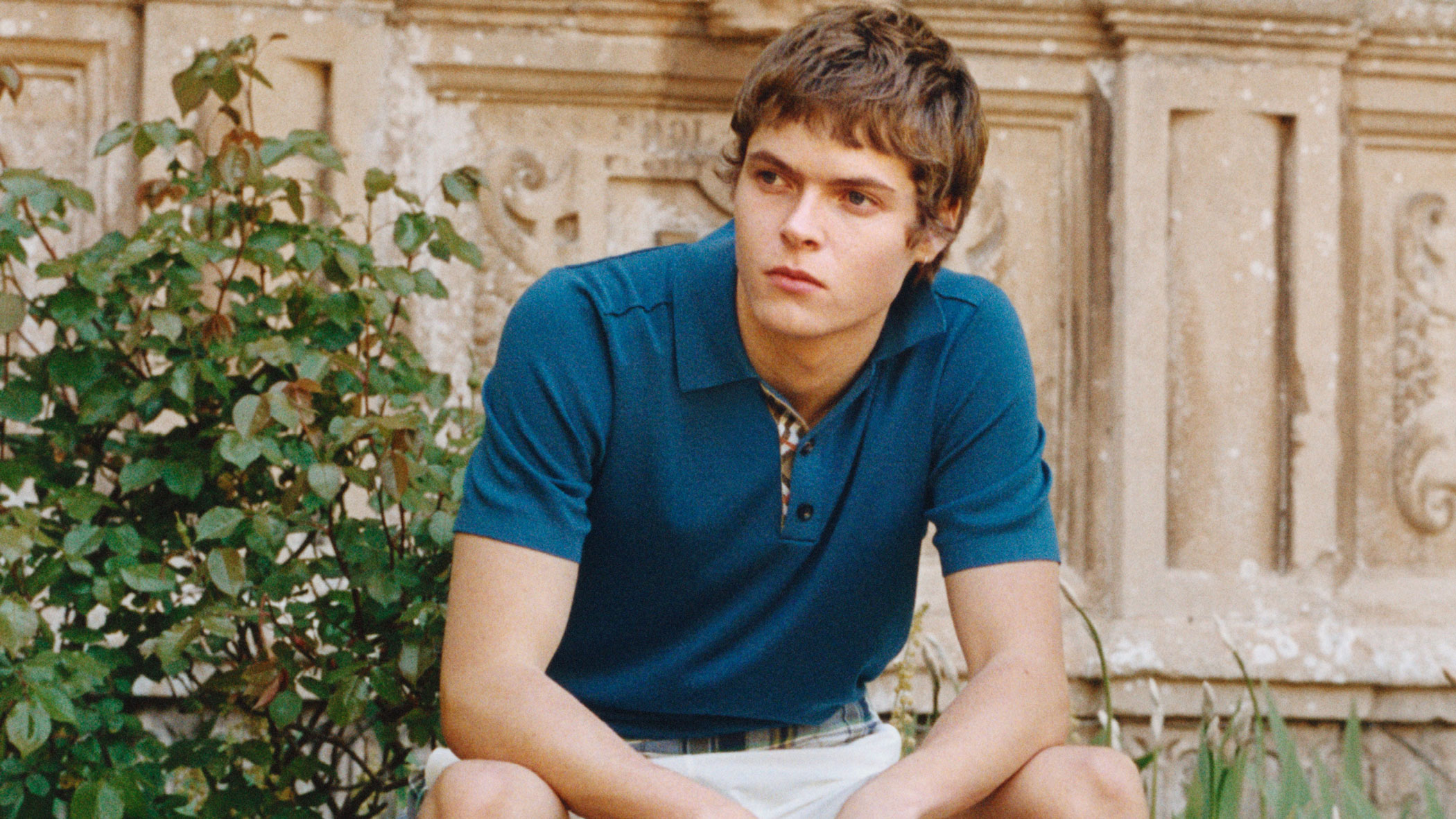 Moses Martin wears a Burberry polo shirt