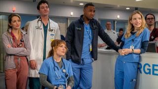 (L-R) Jessica Rothe as Cass Himmelstein, Jack Bannon as Dr. Tom Cole, Jessy Yates as Harper, Jessie T. Usher as Sam Elijah, and Willa Fitzgerald as Danny in their hospital scrubs in Pulse.