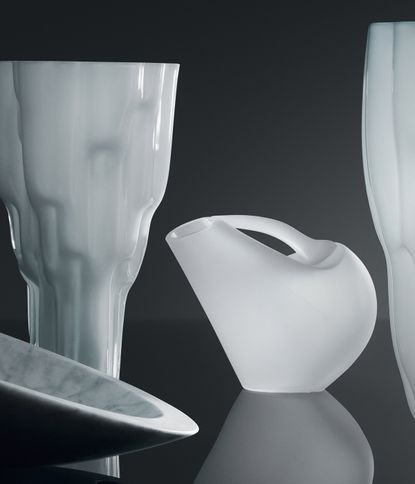 White marble and crystal jugs and bowls.