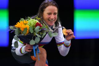 Annemiek van Vleuten (Netherlands) shows off the gold medal