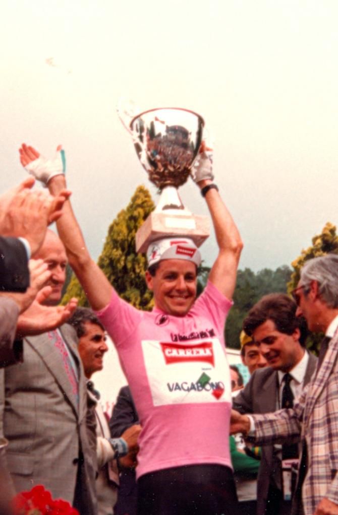 Roche lifts the winner's trophy