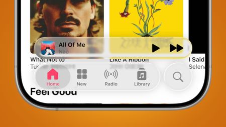 Liquid Glass interface on an orange background