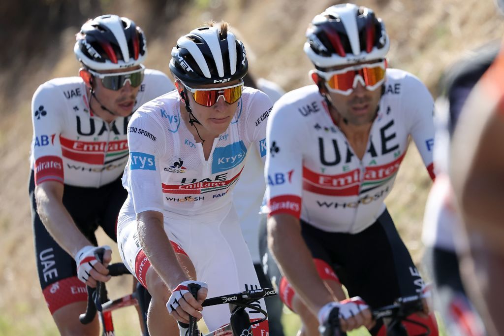 Team UAE Emirates rider Slovenias Tadej Pogacar wearing the best youngs white jersey rides during the 14th stage of the 107th edition of the Tour de France cycling race 197 km between ClermontFerrand and Lyon on September 12 2020 Photo by KENZO TRIBOUILLARD AFP Photo by KENZO TRIBOUILLARDAFP via Getty Images