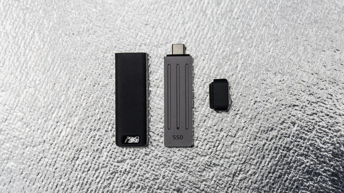 Seagate Ultra Compact SSD on a glass background.