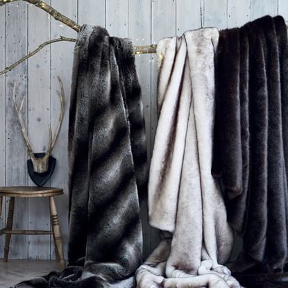 white and black colour faux fur throws