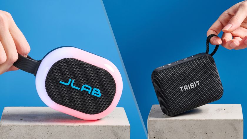 JLab Pop Party photographed on a blue background next to a Tribit PocketGo photographed ona. blue background.