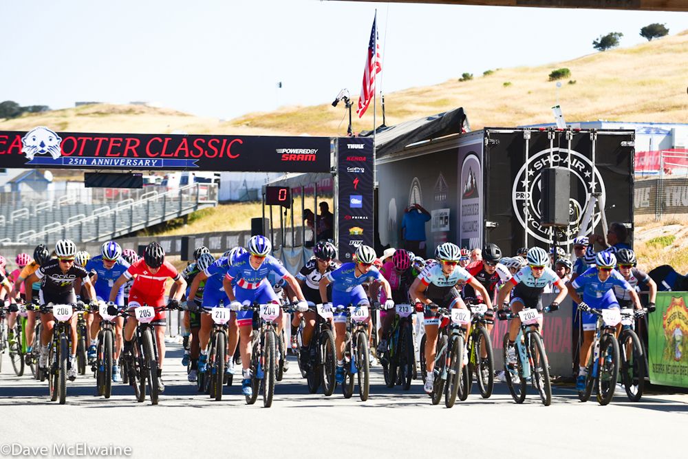 Scott, Specialized, Luna, and Trek women battle at the start of the short track event