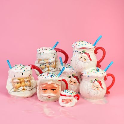 Vintage Santa mugs with cocoa