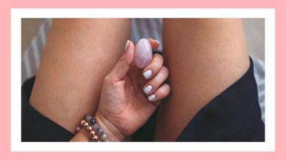 Kegel exercises, woman holding vaginal (yoni) egg between her legs. Rose quartz crystal egg