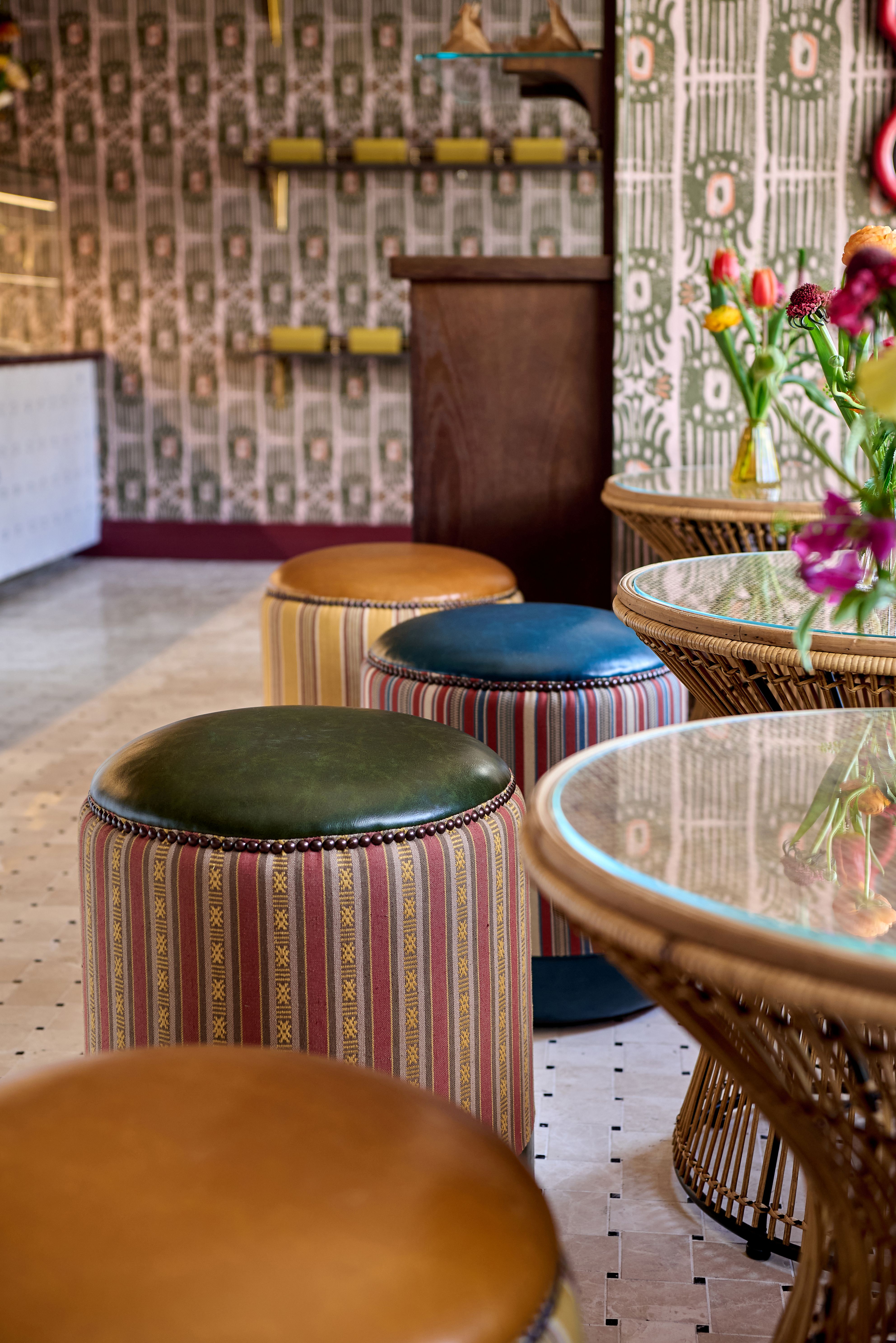 Colourful patterned stools inside Makers chocolate shop