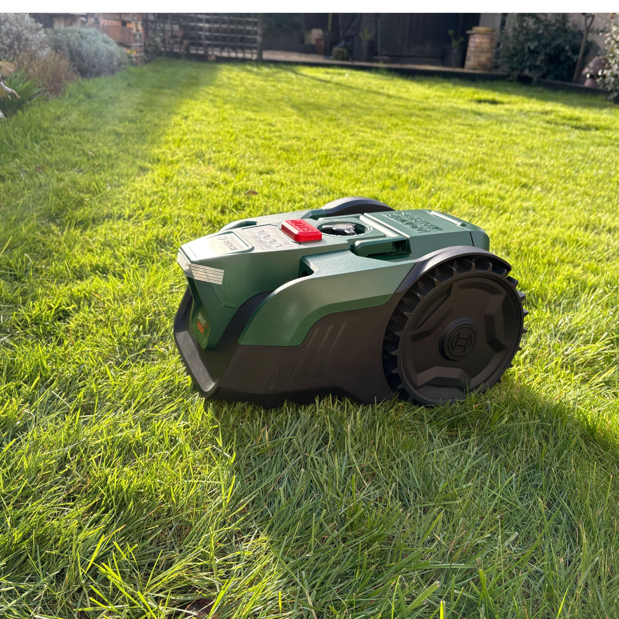 Bosch VISIMOW 18V100 Robot Lawn Mower on grass lawn