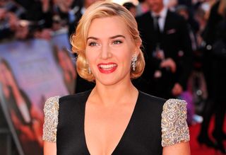 Kate Winslet on the red carpet wearing a black dress
