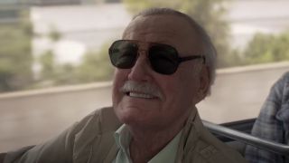 Stan Lee smiling on the bus in Captain Marvel.