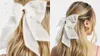 ASOS Design hair bow in white with pearls