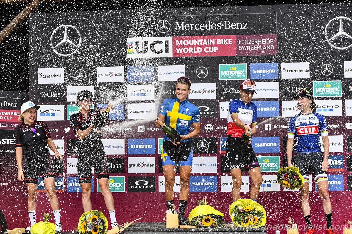 Spraying the bubbly, a podium tradition