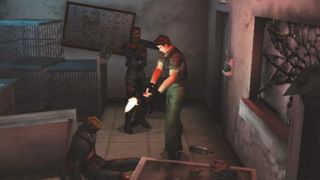 Resident Evil: Code Veronica X screenshot of Chris Redfield shooting a slumped zombie while another lunges at him from the side.