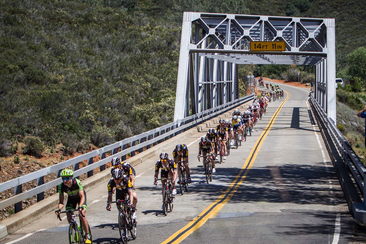 The peloton gets strung out crossing another of today&rsquo;s bridges